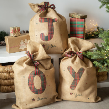 hessian santa sacks personalised with an initial and a name