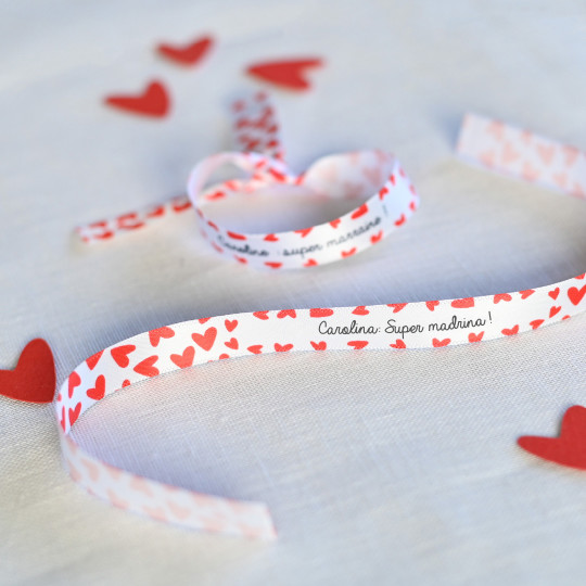 Pulsera identificativa para niños con su nombre y dibujo.