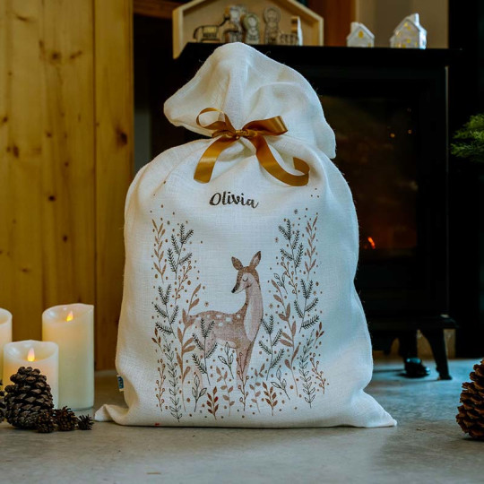 Personalized white burlap Santa sack for Christmas