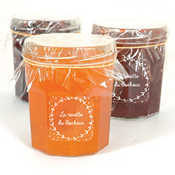 Etiquette transparente personnalisée sur pots de confiture